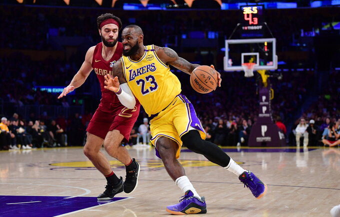 L.Jamesas įsirašė į NBA istoriją (Scanpix nuotr.)