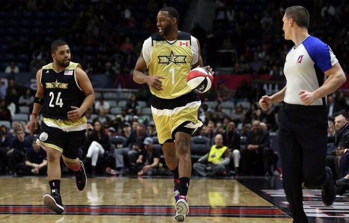 Tracy McGrady rado naują veiklą (Scanpix nuotr.)