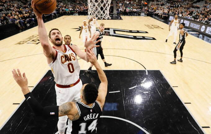 K.Love'o sveikata suabejojo D.Wade'as (Scanpix nuotr.)