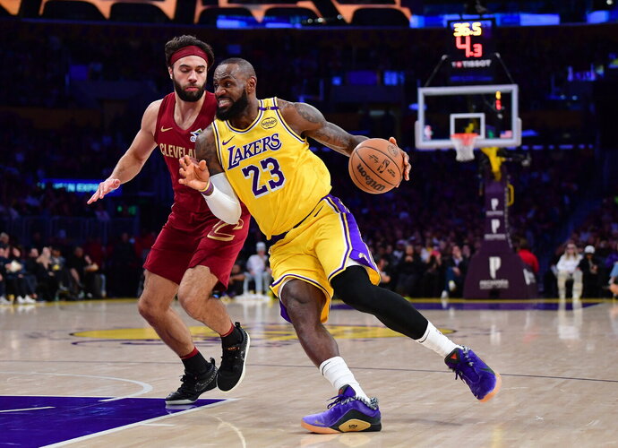 L.Jamesas įsirašė į NBA istoriją (Scanpix nuotr.)