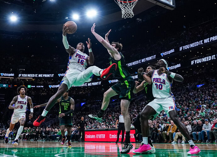 L.Walkeris sužibo prieš „Celtics“ (Scanpix nuotr.)