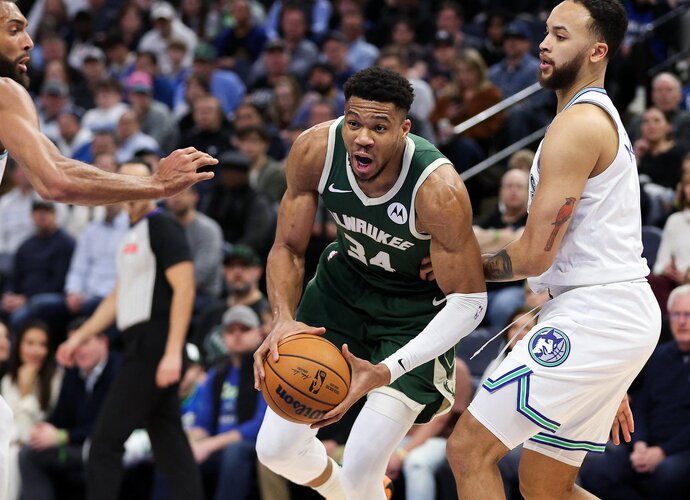 G.Antetokounmpo uždirbo net 21 baudos metimą (Scanpix nuotr.)