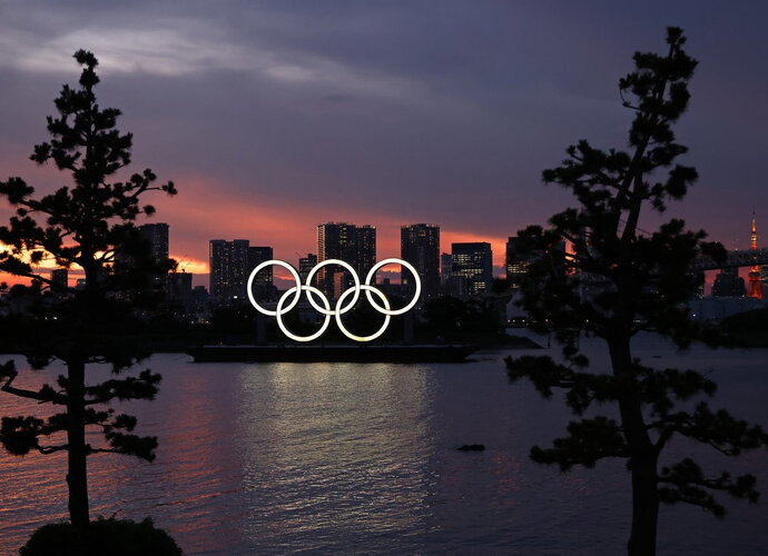 COVID-19 atvejai kelia grėsmę olimpiadai (Scanpix nuotr.)