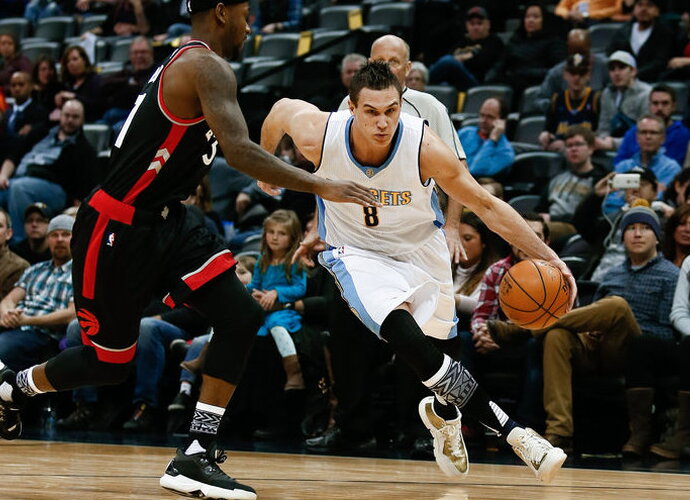D.Gallinari yra laukiamas Bostone (Scanpix nuotr.)