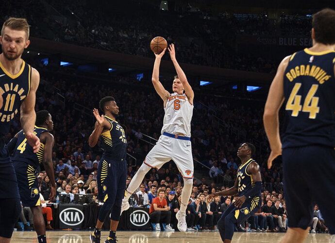 K.Porzingis užstojo prancūzą (Scanpix nuotr.)