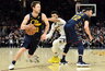 M.Dellavedova keliauja namo (Scanpix nuotr.)